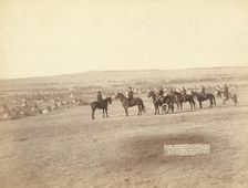Gen Miles and staff viewing the largest hostile Indian Camp in the US, near Pine..., c1891. Creator: John C. H. Grabill