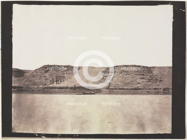 General View of Monuments Carved into Bedrock with Photographer's Dahabieh. Abu Simbel, 1851-1852. Creator: Félix Teynard (French, 1817-1892).