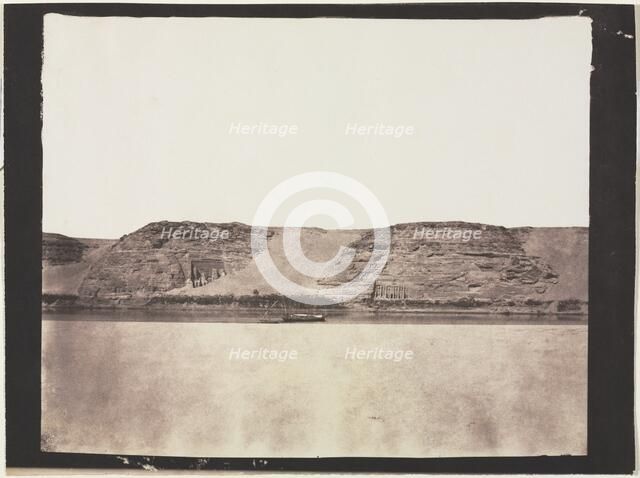 General View of Monuments Carved into Bedrock with Photographer's Dahabieh. Abu Simbel, 1851-1852. Creator: Félix Teynard (French, 1817-1892).