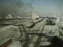 General view of one of the yards of the Chicago and North Western railroad, Chicago, Ill., 1942. Creator: Jack Delano