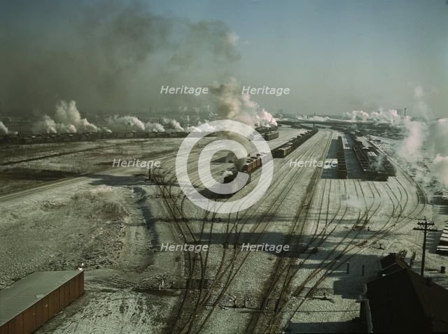 General view of one of the yards of the Chicago and North Western railroad, Chicago, Ill., 1942. Creator: Jack Delano.