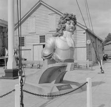 General view of a figurehead from HMS Benbow, Portsmouth Naval Dockyard, 1956. Creator: Eric de Maré