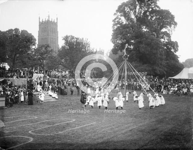 General view of village maypole dance, Chipping Campden, Cotswold, Gloucestershire, 1860-1922. Creator: Henry Taunt.
