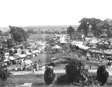 General view of Witney Fair from St Mary's Church tower, West Oxfordshire, Oxfordshire, 1860-1922. Creator: Henry Taunt