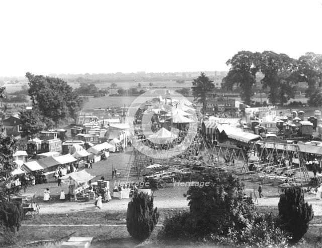 General view of Witney Fair from St Mary's Church tower, West Oxfordshire, Oxfordshire, 1860-1922. Creator: Henry Taunt.