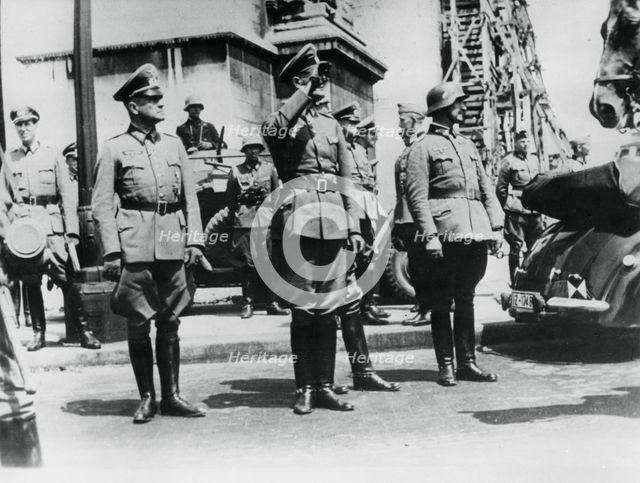 General von Bock saluting German troops parading past the Arc de Triomphe, Paris, 14 June 1940. Artist: Unknown