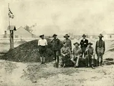 General Baden-Powell, Lord Edward Cecil, and Other Officers, at the Entrance to their "Dug-Out". Creator: D Taylor