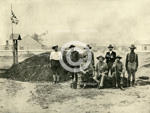 'General Baden-Powell, Lord Edward Cecil, and Other Officers, at the Entrance to their "Dug-Out".',  Creator: D Taylor.