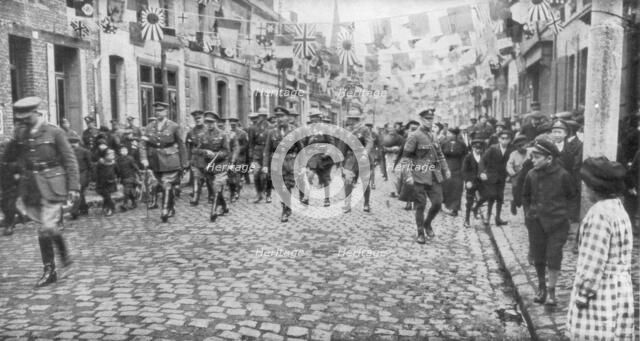 General Currie and Canadian troops walking through a liberated town, 27 October 1918. Artist: Unknown