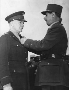 General de Gaulle decorating General Eisenhower, Paris, 14th June 1945. Creator: Unknown