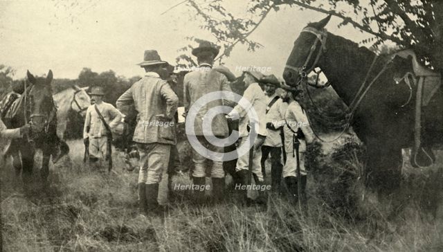'General Lawton Learning from Cuban Officers...June 30th', Spanish-American War, 1898, (1899). Creator: Burr McIntosh.