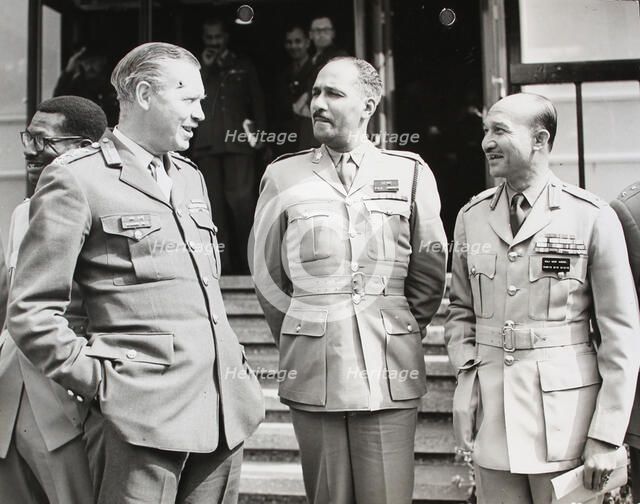 General Sir Richard Hull, Chief of the General Staff talking with Lt-Col. J.C.H. Serette..., 1964. Creator: Unknown.