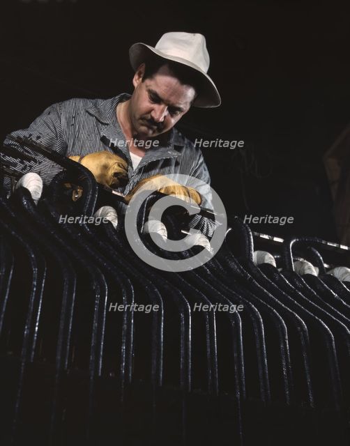 Generator works at the winding of a generator stator...Wilson Dam, Sheffield vicinity, Ala., 1942. Creator: Alfred T Palmer.
