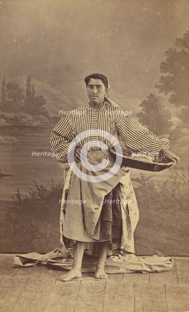 Genre portrait of an unidentified woman holding a basket, 1870-1875. Creator: Ferdinand Berillon.
