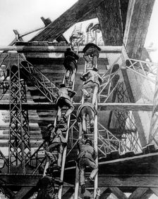 Gentlemen of the press taking the stairs on the Eiffel Tower, Paris, 1888