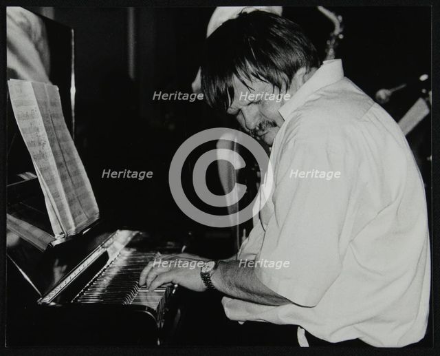 Geoff Eales playing the piano at The Fairway, Welwyn Garden City, Hertfordshire, 11 March 2001. Artist: Denis Williams