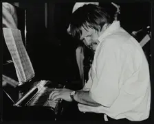 Geoff Eales playing the piano at The Fairway, Welwyn Garden City, Hertfordshire, 11 March 2001. Creator: Denis Williams