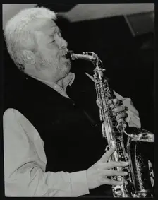 Geoff Simkins playing alto saxophone at The Fairway, Welwyn Garden City, Hertfordshire, 2002. Creator: Denis Williams