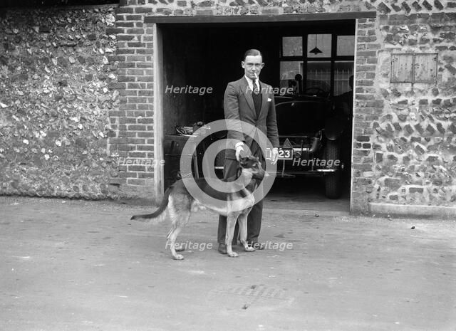 Geoffrey Baker and his alsatian. Artist: Bill Brunell.