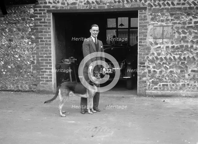 Geoffrey Baker and his alsatian. Artist: Bill Brunell.