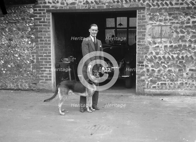 Geoffrey Baker and his alsatian. Artist: Bill Brunell.