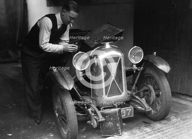 Geoffrey Baker working on a Salmson 1090cc car. Artist: Bill Brunell.