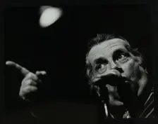 George Melly on stage at the Forum Theatre, Hatfield, Hertfordshire, 8 April 1983. Creator: Denis Williams
