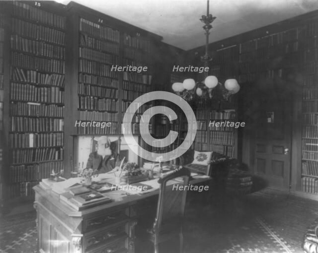 George Bancroft, 1800-1891, half-length portrait, seated at desk in library, facing front, c1880s. Creator: Unknown.