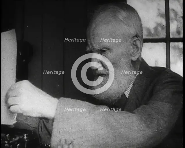 George Bernard Shaw Setting up a Typewriter, 1930s. Creator: British Pathe Ltd.