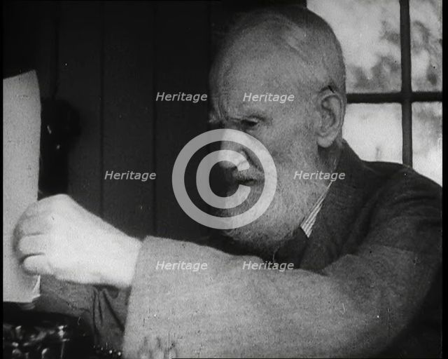 George Bernard Shaw Setting up a Typewriter, 1930s. Creator: British Pathe Ltd.
