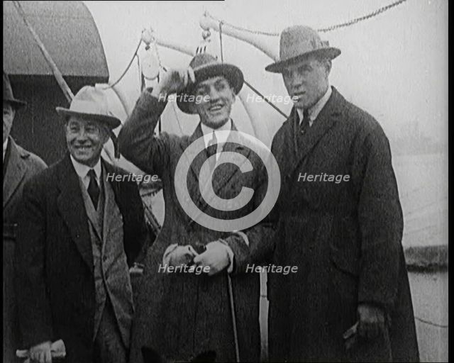 George Carpentier With Associates on the Deck of a Ship, 1921. Creator: British Pathe Ltd.