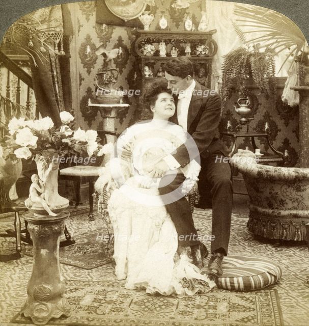 'George Greatly Admires Ethel's Beautiful Complexion'.Artist: Underwood & Underwood