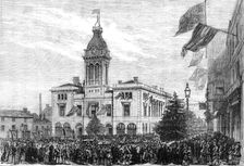 George Stephenson Centenary Festival: procession of benefit societies passing the Market-Hall, 1881. Creator: Unknown