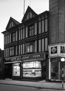George Schonhut's butchers shop in Rotherham, South Yorkshire, 1955. Creator: Michael Walters