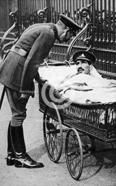 George V with a wounded soldier, 7th Battalion Sherwood Foresters, March 1918. Artist: Unknown