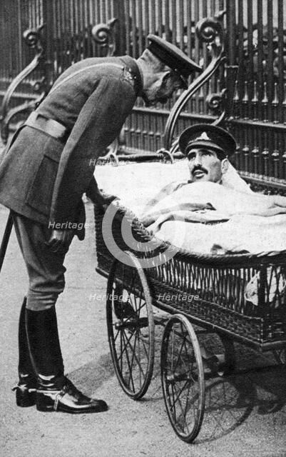 George V with a wounded soldier, 7th Battalion Sherwood Foresters, March 1918. Artist: Unknown