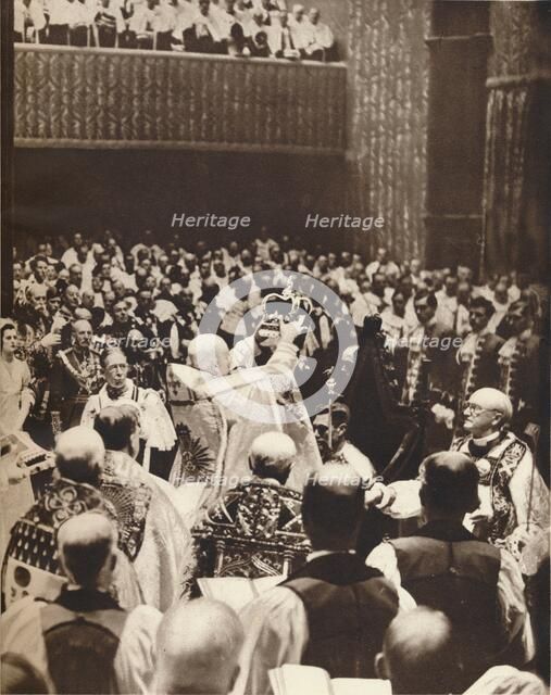 'George VI is crowned with St. Edwards Crown on the day of his coronation', 1937. Artist: Unknown.