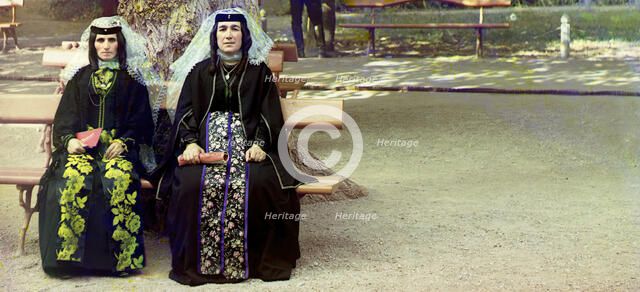 Georgian women in holiday attire in the park of Borzhom, between 1905 and 1915. Creator: Sergey Mikhaylovich Prokudin-Gorsky.