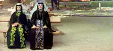 Georgian women in holiday attire in the park of Borzhom, between 1905 and 1915. Creator: Sergey Mikhaylovich Prokudin-Gorsky