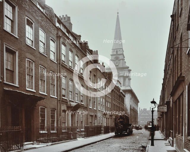 Georgian terraced houses and Christ Church, Spitalfields, Stepney, London, 1909. Artist: Unknown.