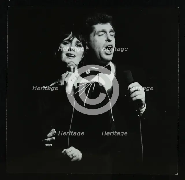 Georgie Fame and Sweet Substitute with Keith Smith's Hefty Jazz in concert, 1984. Creator: Denis Williams.