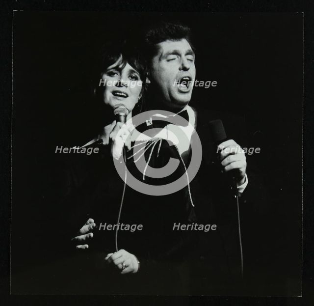 Georgie Fame and Sweet Substitute with Keith Smith's Hefty Jazz in concert, 1984. Creator: Denis Williams.