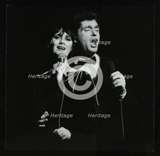 Georgie Fame and Sweet Substitute with Keith Smith's Hefty Jazz in concert, 1984. Artist: Denis Williams