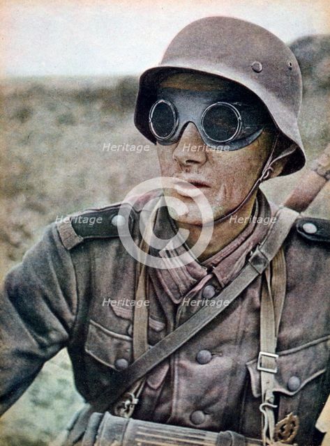 German motorcycle trooper heading eastwards, Russia, 1942. Artist: Unknown