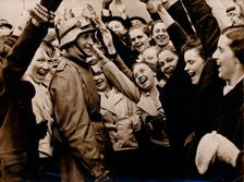 German motorized troops are greeted on their arrival in Vienna, Austria, 1938. Creator: Unknown