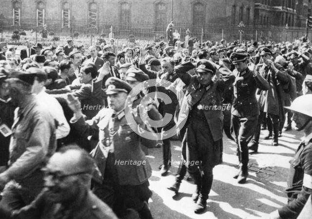 German officers surrendering, Rue de Rivoli, Paris, August 1944. Artist: Pierre Mandé