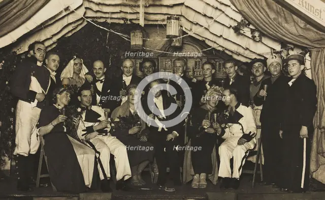 German actors, some in drag, gather on stage at a party, 1930-45. Creator: Unknown.