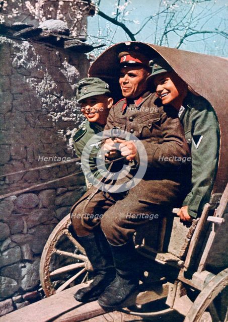 German alpine troops in a cart with a Bulgarian soldier, Struma Valley, Bulgaria, 1941. Artist: Unknown