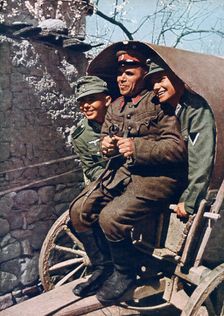 German alpine troops in a cart with a Bulgarian soldier, Struma Valley, Bulgaria, 1941