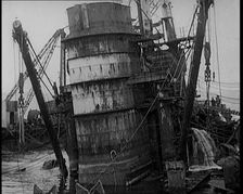 German Battleships Being Salvaged in Scapa Flow, 1926. Creator: British Pathe Ltd